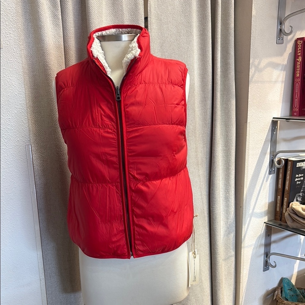 Red Puffer Dylan Vest, reversible with Sherpa lining and pockets. NWT. $72